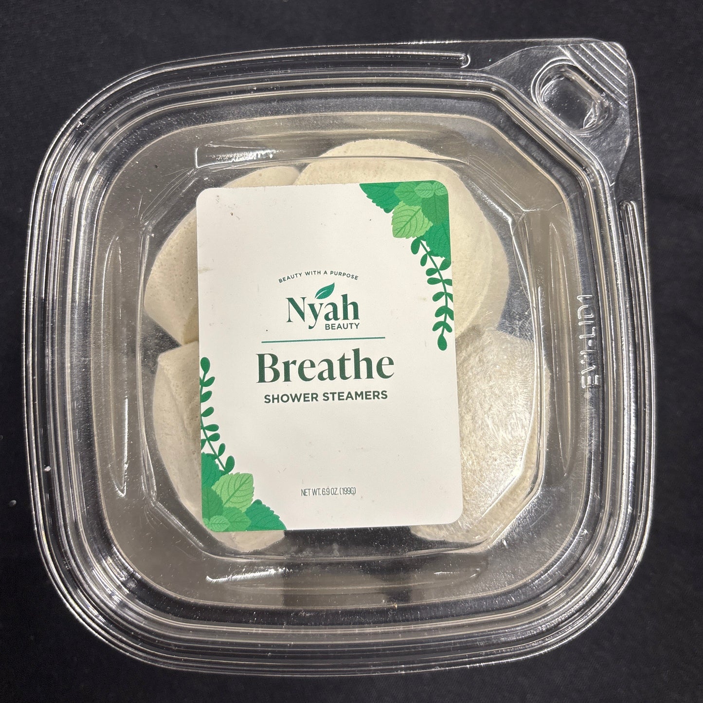 Shower steamers in clear packaging